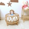 Rattan doll bed